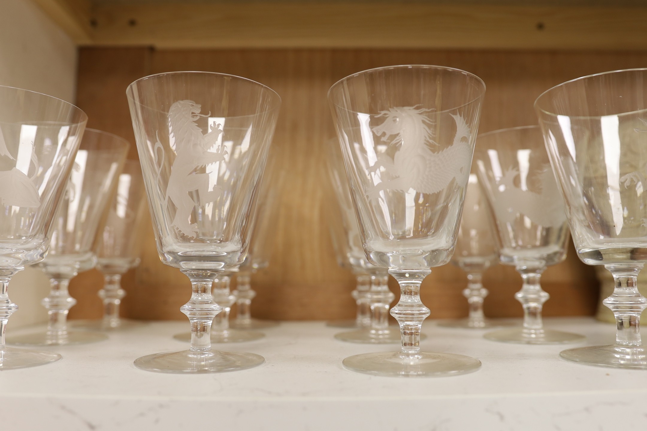 A set of twelve Stephen Rickard engraved glasses, 15cm tall